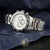 Pulsera de hombre con correa de acero inoxidable y bisel de cerámica negra, esfera blanca