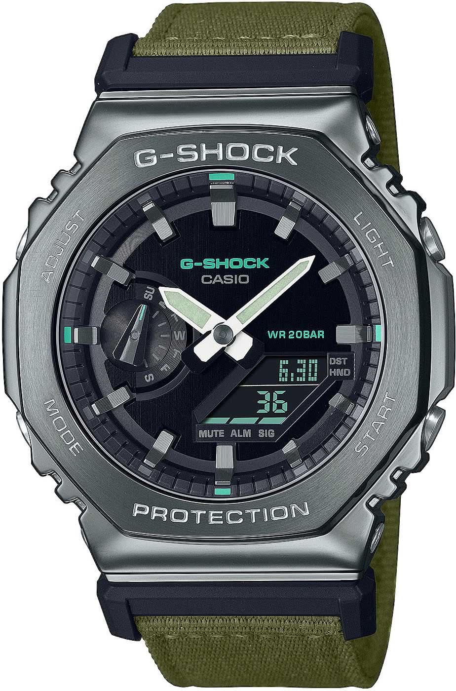 Reloj Casio G-Shock para hombre con correa textil verde y esfera negra, WR 20 BAR.