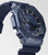 G-Shock reloj para hombre de lado: corona y pulsadores en la caja protectora azul