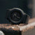 Reloj G-Shock negro para mujer con esfera redonda y correa de caucho.
