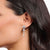 "Pendientes largos plateados en la oreja con motivo de corazón rojo y colgante de estrella"