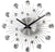 Reloj de pared JVD con diseño metálico, ejes de manecillas redondos y rayos, botones de cristal brillantes