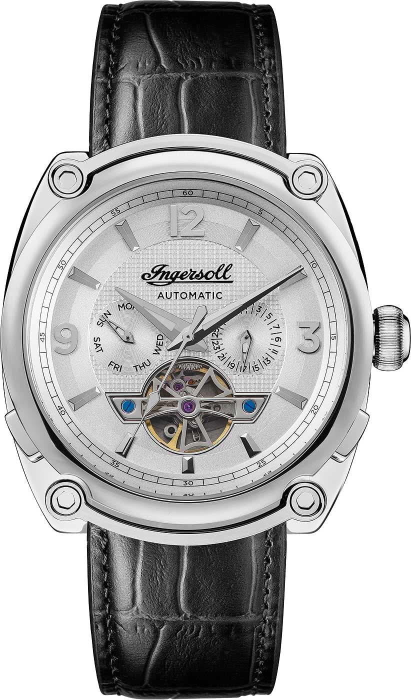 Reloj de hombre con correa de cuero negra y esfera plateada, movimiento automático visible