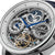 Reloj de hombre con esfera plateada esqueletizada, indicador de luna y manecillas de segundos azules