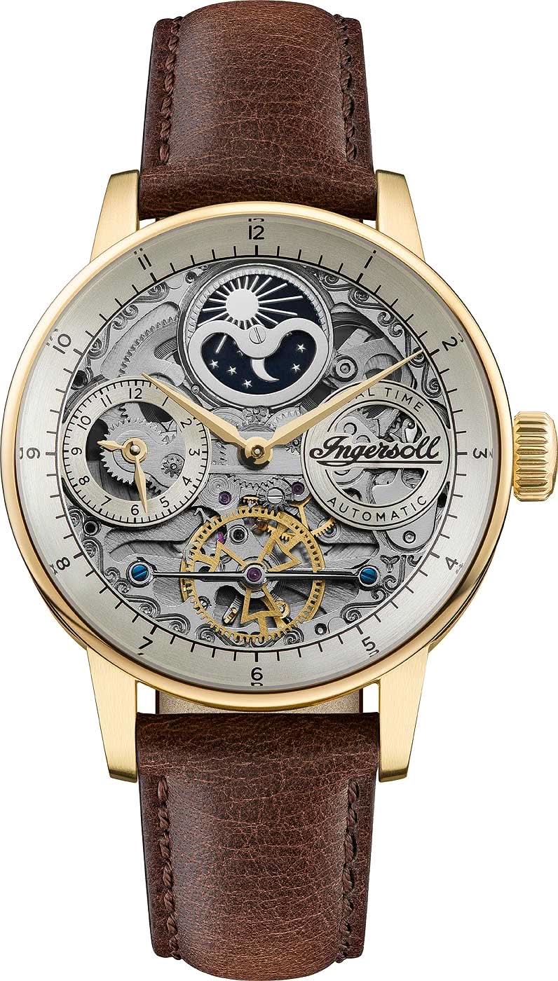 Pulsera de hombre con caja dorada, correa de cuero marrón y movimiento automático visible