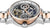 Reloj de hombre de perfil con corona inferior y bisel con acabado en oro rosa, caja de acero inoxidable.