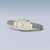 Reloj de mujer con esfera rectangular, bisel dorado y brazalete Milanesa