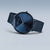 Reloj Bering Ultra-Slim con esfera azul y correa milanesa azul, perfil delgado
