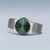 Reloj de hombre con esfera verde y pulsera milanesa plateada, caja redonda