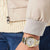 Pulsera de oro y plata para hombre con esfera blanca