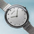 Reloj de mujer con esfera plateada y marcadores de índice, correa milanesa, Bering