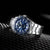 Reloj de pulsera Seiko para hombre con caja redonda de acero inoxidable plateado y esfera azul, vista lateral
