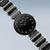 "Reloj de mujer con esfera redonda negra y pulsera bicolor de cerámica"