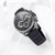 Reloj SEIKO Chronograph para hombre con caja oscura, esfera negra y correa de caucho