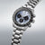 Cronógrafo para hombre con brazalete de metal, esfera azul, subesferas negras de cronómetro, pulsadores