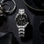 Pulsera de acero inoxidable plateado para hombre con esfera negra, vista lateral