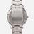 Reverso de un reloj de pulsera para hombre con inscripción SEIKO y brazalete de metal