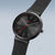 Reloj Bering con esfera redonda negra, segundero rojo y correa negra