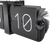 Reloj de mesa abatible vista lateral: carcasa negra, números 1 y 0, engranaje