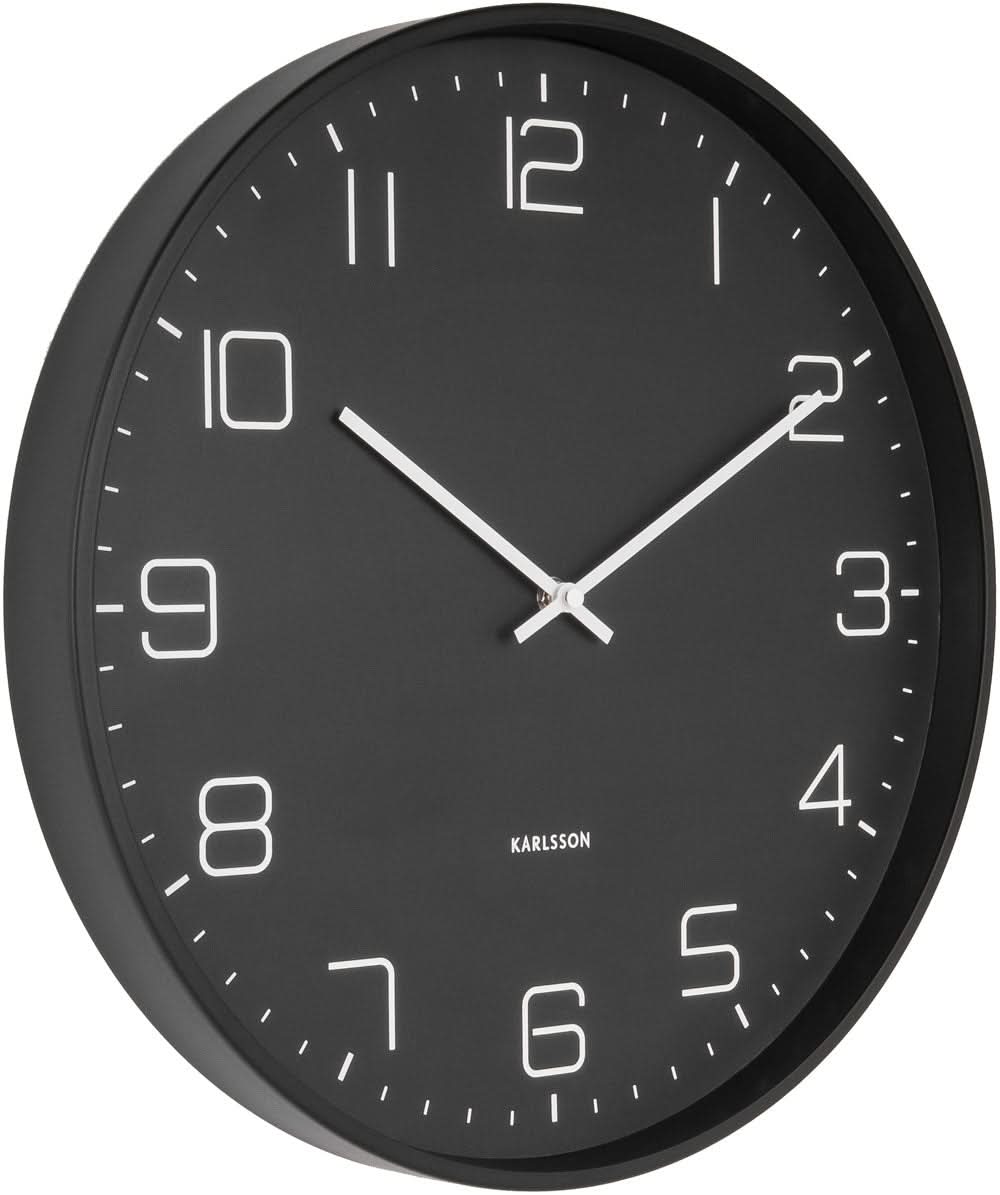 Reloj de pared negro con índices y manecillas claros, marco metálico redondo