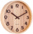 Reloj de pared redondo de madera con números, manecillas y texto Karlsson en marrón