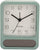 Reloj despertador cuadrado de plástico con carcasa color menta, esfera analógica y ventana inferior