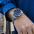 Reloj Festina Chrono Bike para hombre en la muñeca, esfera azul, correa de acero inoxidable plateada