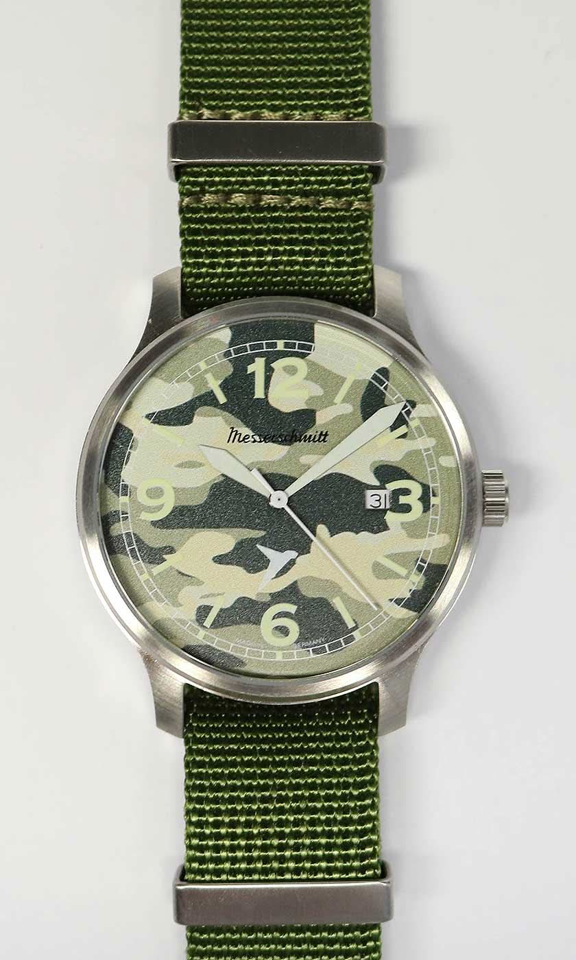 Reloj Messerschmitt para hombre con correa de tela verde oliva y esfera con estampado de camuflaje