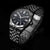 Pulsera de hombre con correa de acero inoxidable y esfera azul oscuro, puntos luminosos, caja redondeada
