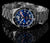 Reloj Marc and Sons para hombre con esfera azul, correa de acero inoxidable y bisel reflectante.