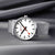 Reloj Mondaine para hombre con correa de malla plateada, esfera blanca con manecillas rojas