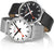 Dos relojes: esferas negras con correa de cuero y correa de metal.