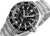 Reloj de hombre con esfera negra, aguja GMT roja, bisel y correa plateados