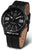 Reloj de hombre con esfera negra, manecillas negras y logotipo de Vostok Europe, correa de cuero
