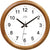 Reloj de pared redondo de madera con esfera blanca, manecillas negras y logo de JVD.