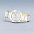 Bering reloj de mujer con pulsera de cerámica blanca y bisel dorado, vista general
