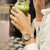 "Reloj Citizen Promaster para mujer en la muñeca: pulsera rosa y esfera gris claro"