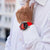 Reloj conectado para hombre en la muñeca: correa de silicona roja, esfera negra, caja plateada