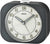 Despertador analógico Seiko con esfera redonda blanca y carcasa de plástico oscuro