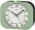 Seiko despertador clásico con caja redonda de plástico verde, esfera blanca y manecillas analógicas