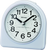 Despertador analógico Seiko con caja azul y esfera negra, manecillas y segundero