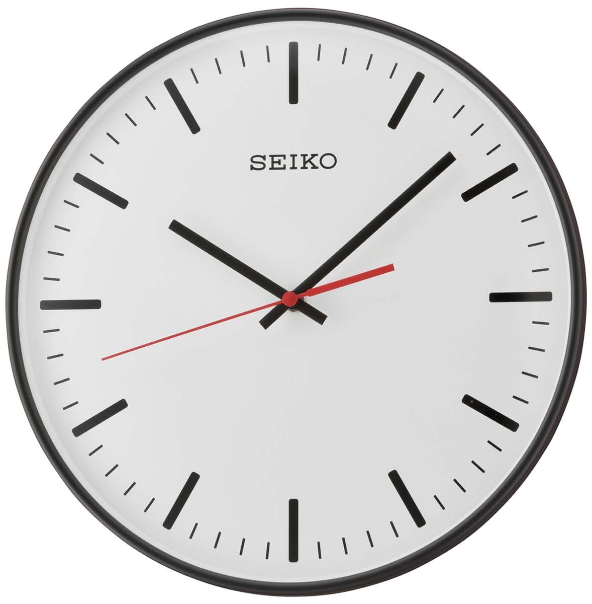 "Reloj de pared: marco negro, esfera blanca, manecillas negras con segundero rojo"