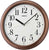 Reloj de pared redondo con marco de plástico marrón y esfera blanca, números romanos, SEIKO