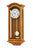 Reloj de pared de madera con péndulo, esfera redonda y frente de cristal en marco marrón