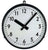 Reloj de pared redondo con marco de metal negro, esfera blanca y manecillas negras