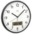 Reloj de pared radiocontrolado con marco de plástico negro, esfera analógica y pantalla digital