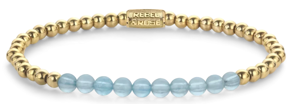 Pulsera con cuentas de aguamarina azul claro y espaciadores de acero inoxidable en tono dorado