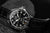 Pulsera de hombre con esfera negra, caja plateada y correa de cuero negra