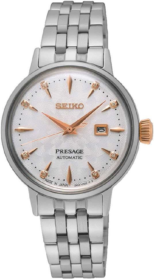 "Reloj de mujer con pulsera de acero inoxidable plateado y esfera clara, automático, agujas doradas"