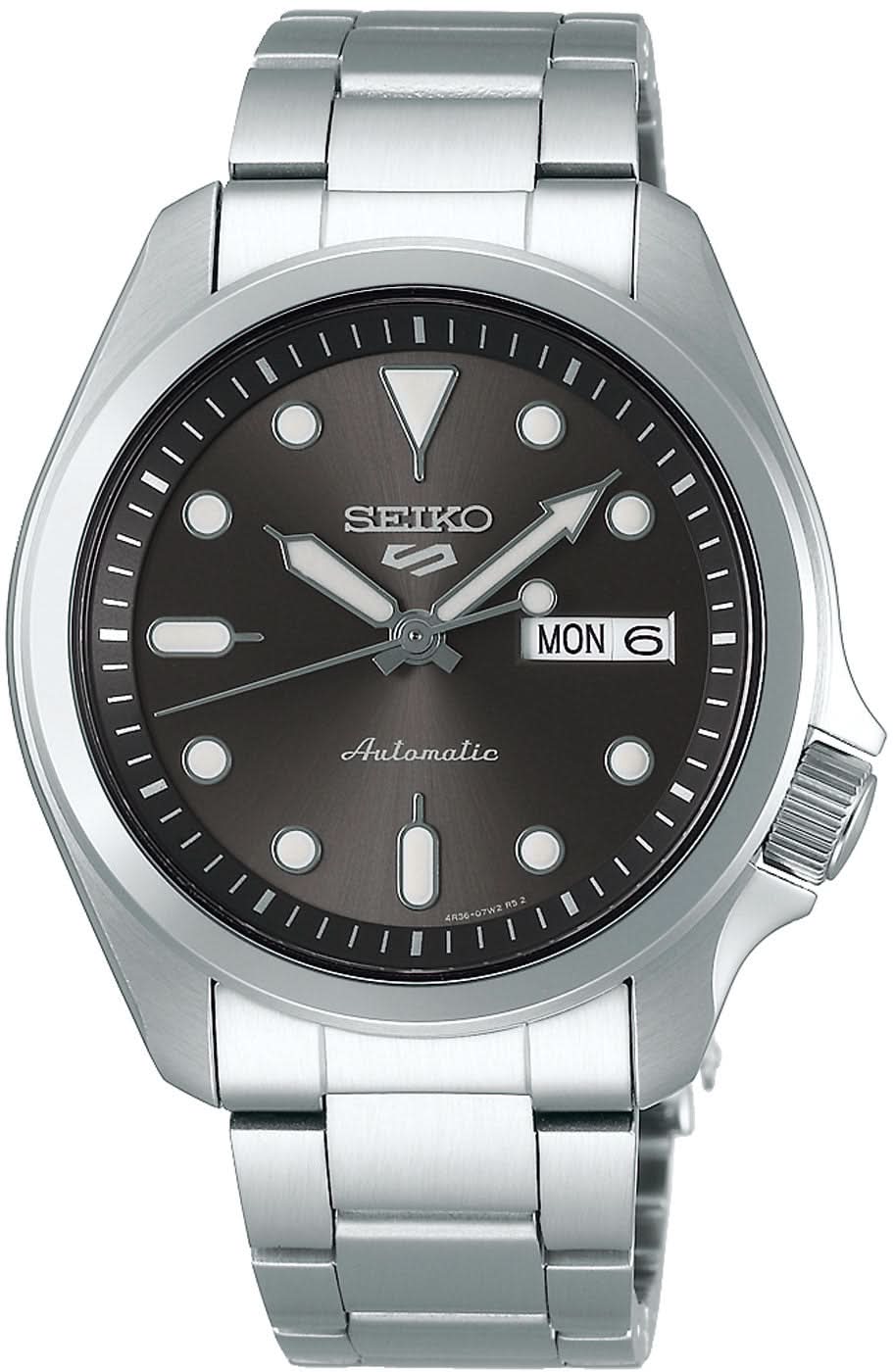 Pulsera de hombre con correa de acero inoxidable, esfera oscura, indicador de fecha "MON" y logo automático